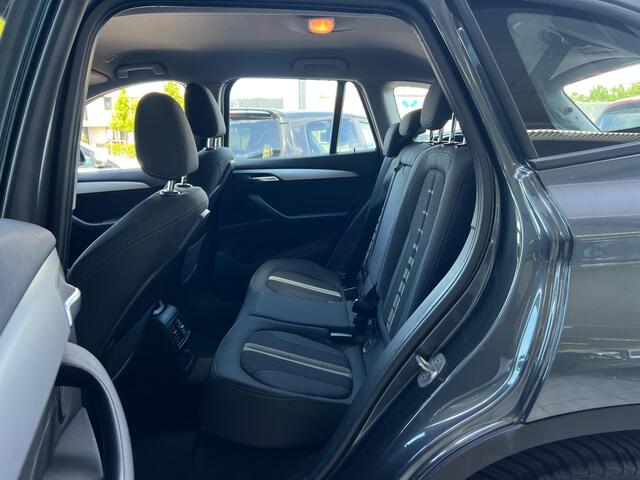 BMW X1 sDrive18i Centennial High Executive NL AUTO | CAMERA | STOELVERW | NAVI | TREKHAAK |