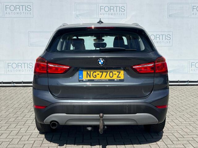 BMW X1 sDrive18i Centennial High Executive NL AUTO | CAMERA | STOELVERW | NAVI | TREKHAAK |