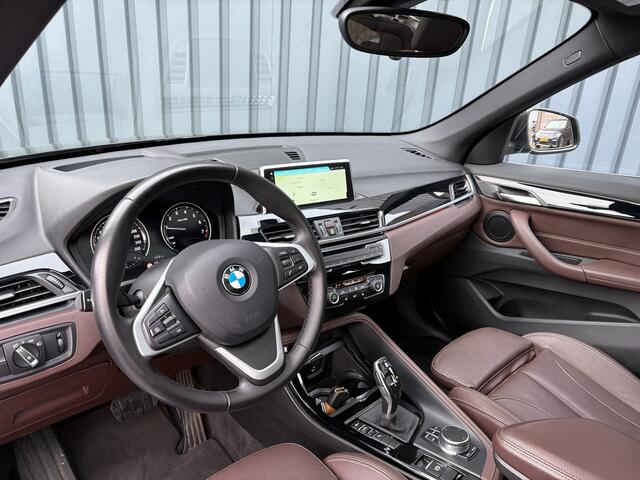 BMW X1 sDrive20i High Executive | Trekhaak afnb. | Panodak | Head Up | Camera | Elk. A-klep | Leder | Prijs Rijklaar!!