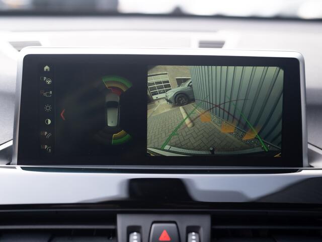 BMW X1 sDrive20i High Executive | Trekhaak afnb. | Panodak | Head Up | Camera | Elk. A-klep | Leder | Prijs Rijklaar!!