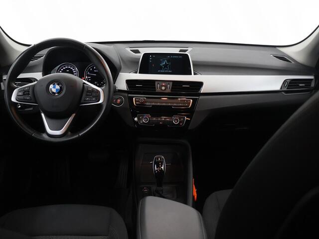 BMW X1 sDrive20i Executive | Trekhaak | LED | Navigatie | 1800kg trekkracht | PDC | Climate Control | Cruise Control | Ele. kofferdeksel |