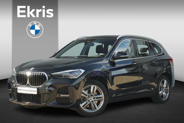 BMW X1 xDrive25e High Executive M Sportpakket 18'' / Head-Up Display / Stoel & Stuurverwarming / Driving Assistant / Parkeersensoren voor en achter