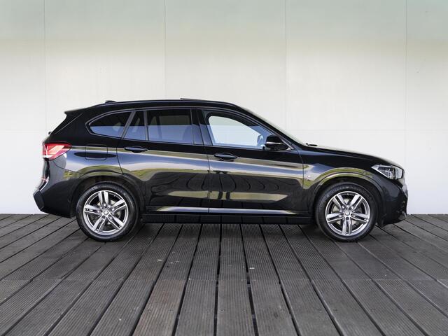 BMW X1 sDrive18i | M Sportpakket | Achteruitrijcamera | Panoramadak | Cruise Control | 18''