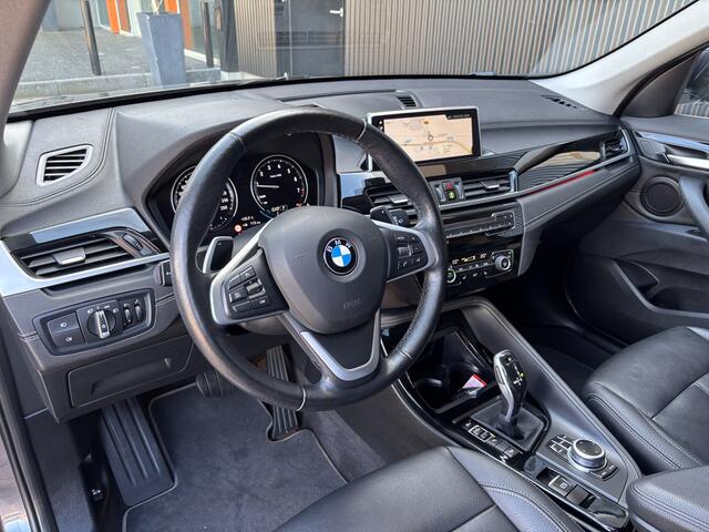 BMW X1 xDrive20i High Executive Trekhaak I Navi I Leder