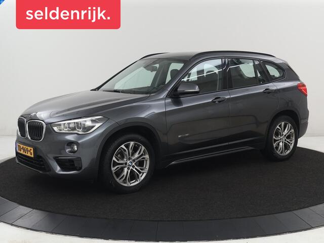 BMW X1 sDrive18i Sport Line | Leder | Trekhaak | Stoelverwarming | Sportstoelen | Camera | Navigatie | Keyless | Climate control | 18'' velgen | Park Assist | Cruise control | Bluetooth | Full LED