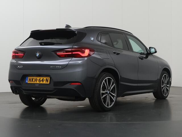 BMW X2 xDrive25e High Executive | M-Pakket | Panoramadak | Sportstoelen | HUD | M-Sportstoelen Elektrisch verstelbaar + Geheugen | Camera | Navigatie | DAB | Stoelverwarming | Ele. kofferdeksel |