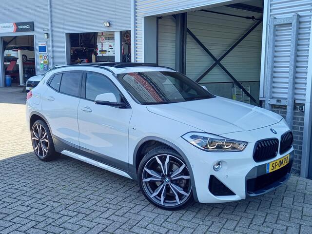 BMW X2 sDrive20i High Executive M-SPORT - PANO - HUD - TREKHAAK - LEER - CAMERA - PDC V/A - STOELVERW -