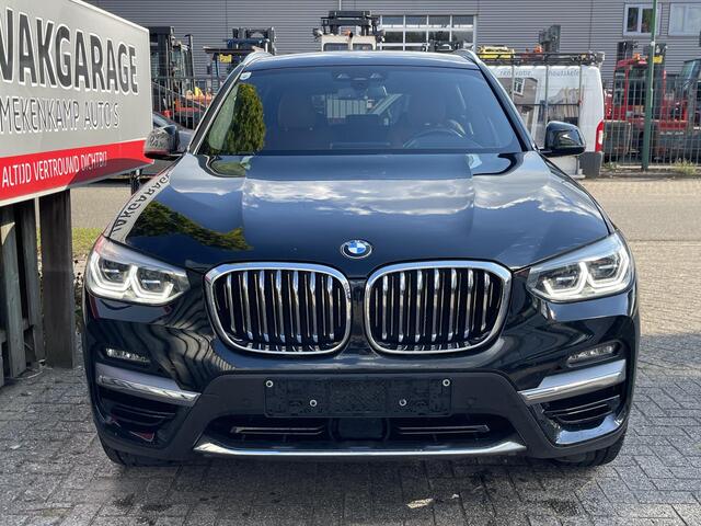 BMW X3 xDrive30e High Executive 20"/Trekhaak/Leder/Sportstoelen/Adaptieve cruise/Camera/HiFi/Keyless/Dodehoek/Head-up