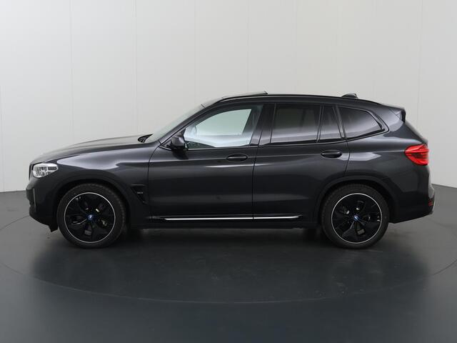 BMW X3 iX3 High Executive 80 kWh | M-Pakket | SOH 95% | Panoramadak | Adaptieve Cruise Control | Ele. verstelbare stoelen + geheugen | Sportstoelen | 360 Camera | Apple CarPlay/Android Auto | Trekhaak El. uitklapbaar | HUD |