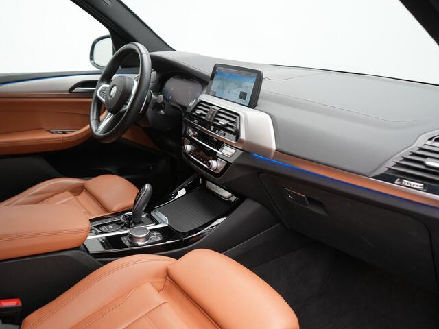BMW X3 xDrive30e M Sport Plug In Hybrid 293pk Dealer O.H. PHEV | Trekhaak Af Fabriek | Head Up | 360 Camera | Adaptief Onderstel | Lederen Sportstoelen & Stuur Verwarmd | Sfeerverlichting | Keyless | Blis | Navigatie | DAB | Virtual |