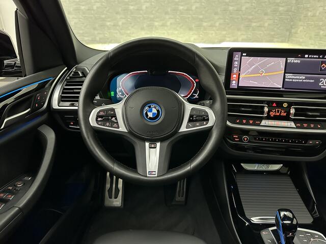 BMW X3 iX3 M-Sport 80 kWh | Panorama | Leder | 99% SOH | ACC | Trekhaak | Memory | Camera | 3-Zone Clima | Carplay | Getint Glas | Black-Optic | Stoelverwarming | Draadloos Laden | Bovag Garantie |