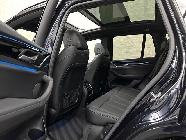 BMW X3 iX3 M-Sport 80 kWh | Panorama | Leder | 99% SOH | ACC | Trekhaak | Memory | Camera | 3-Zone Clima | Carplay | Getint Glas | Black-Optic | Stoelverwarming | Draadloos Laden | Bovag Garantie |