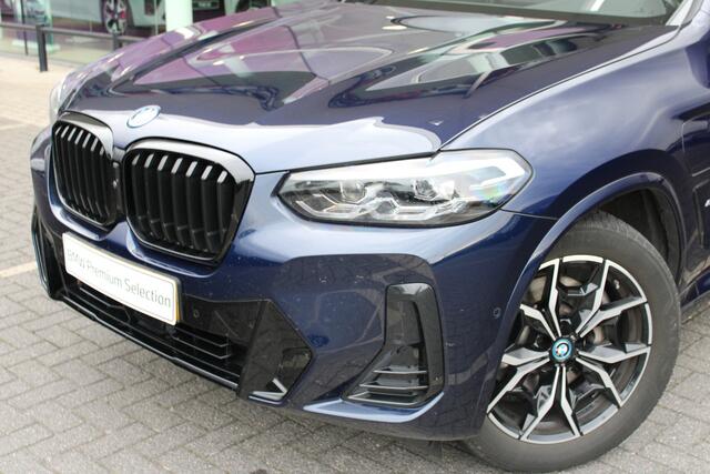 BMW X3 xDrive30e High Executive M Sport Automaat / Panoramadak / Trekhaak / Sportstoelen / LED / Parking Assistant Plus / Stoelverwarming / Live Cockpit Professional