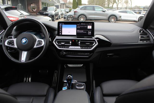 BMW X3 iX3 High Executive 80 kWh / SoH 92,3% / Trekhaak / Panoramadak / 360Camera / Head-up / 20'' / Leder / Harman Kardon / Sfeerverlichting / Dodehoek / DAB / Stuur+Stoelverwarming / ACC