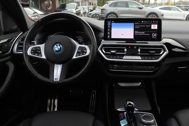 BMW X3 iX3 High Executive 80 kWh / SoH 92,3% / Trekhaak / Panoramadak / 360Camera / Head-up / 20'' / Leder / Harman Kardon / Sfeerverlichting / Dodehoek / DAB / Stuur+Stoelverwarming / ACC