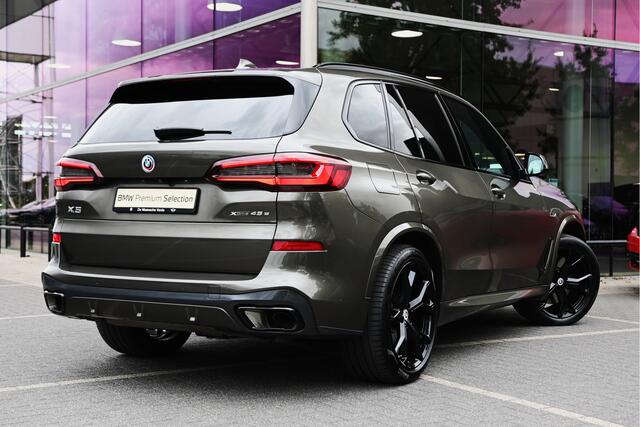 BMW X5 xDrive45e High Executive M Sport Automaat / Panoramadak / Trekhaak / Adaptief onderstel / Soft-Close / Stoelventilatie / Massagefunctie / Laserlight / Comfort Access / Head-Up / Harman Kardon