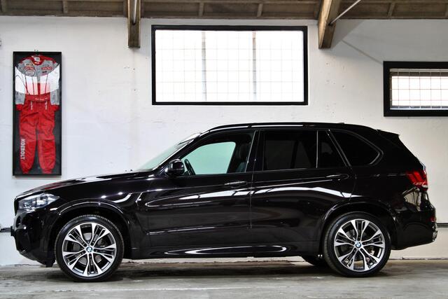 BMW X5 xDrive35i High Executive | Rubinschwarz | M-Sport | Trekhaak | B&O | Panoramadak | NL auto | BMW onderhouden |