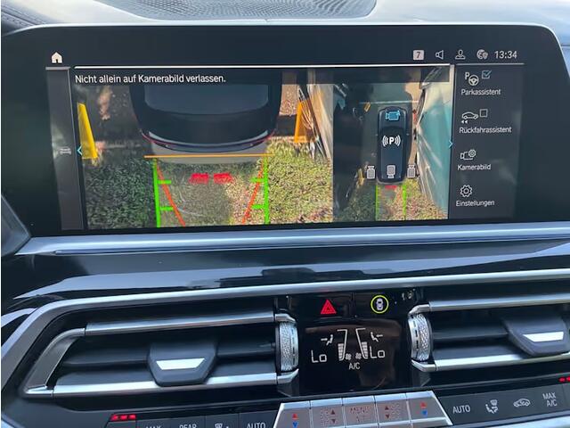 BMW X5 xDrive45e High Executive M-Sport Panoramadak Head-Up Display 22 Inch Laser Licht Trekhaak 4WD Besturing Buitenspiegels M Carbon Keyless Entry