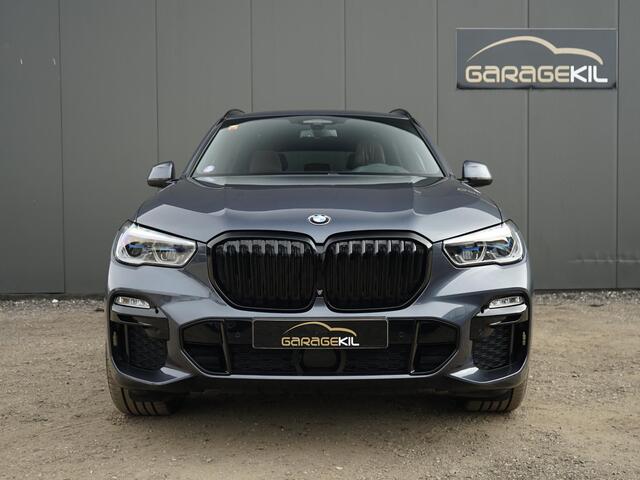 BMW X5 xDrive40i High Executive M-Sport /Achteras best. / Orig.NL / Pano dak / Merino/Crafted clarity /22'' LM velgen /Laser / Warmte comfort / Head-Up / Leder dash / Sky Lounge /