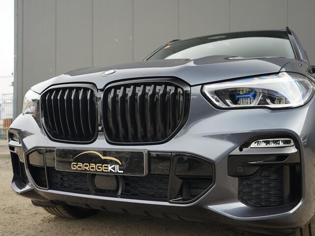 BMW X5 xDrive40i High Executive M-Sport /Achteras best. / Orig.NL / Pano dak / Merino/Crafted clarity /22'' LM velgen /Laser / Warmte comfort / Head-Up / Leder dash / Sky Lounge /