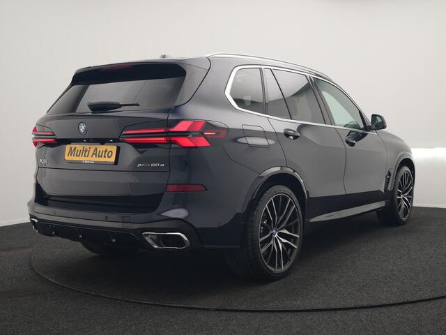 BMW X5 xDrive50e M Sport PHEV 490pk Dealer O.H. | Panodak Sky Lounge | Luchtvering | Head Up | 360 Camera | Harman / Kardon | Nappa Lederen Comfortstoelen Memory & Verwarmd | Apple Carplay | Keyless | Blis | 22"L.M | Plug In Hybrid |