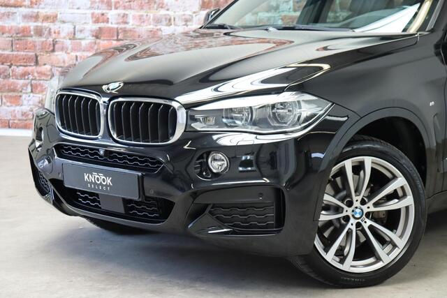 BMW X6 xDrive35i High Executive M Sport Pakket Automaat / Navigatiesysteem Professional / Driving Assistant Plus / Schuif-/kanteldak / Trekhaak / Adaptief M-onderstel / Comfortstoelen / Head-Up Display / Adaptieve LED-koplamp / Shadow Line / 20 Inch / Extra Geti
