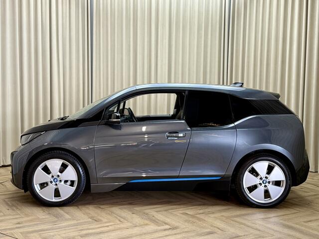 BMW i3 Basis Comfort 22 kWh *Voorverwarming* Org.NL! / Leder / Stoelverwarming / Navigatie / Cruise / 19'' LMV