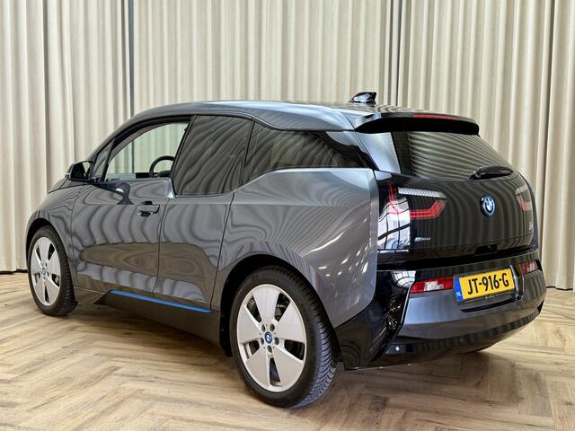 BMW i3 Basis Comfort 22 kWh *Voorverwarming* Org.NL! / Leder / Stoelverwarming / Navigatie / Cruise / 19'' LMV