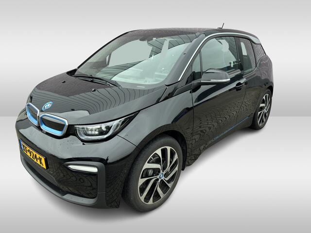 BMW i3 Basis 120Ah 42 kWh / Navigatie / 19'' / Parkeerhulp achter / Navigatie / Harman Kardon / Stoelverwarming / Cruise Control / Warmtepomp / Getint glas