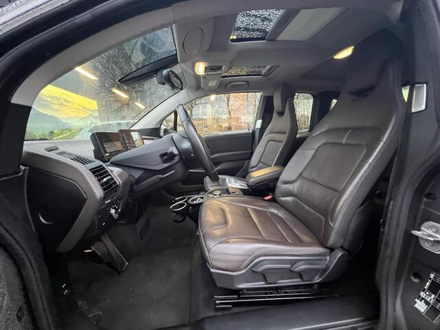 BMW i3 Business Edition Plus 120Ah 42 kWh | SOH 91.2% | Schuifkanteldak | Leder | Adaptieve Cruise Control | Stoelverwarming
