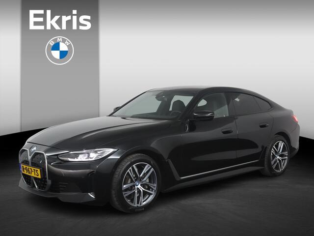 BMW i4 eDrive40 84 kWh Trekhaak Elektrisch | Camera | Parkeersensoren voor en achter | Stoelverwarming | Harman Kardon | M Hemelbekleding Anthrazit