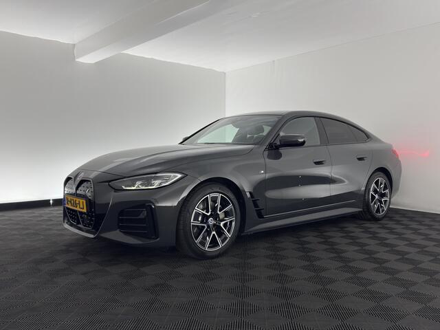 BMW i4 eDrive40 84 kWh M-Sportpack [ 3-Fase ] (INCL-BTW) *LEATHER-MICROFIBRE | FULL-LED | ADAPTIVE-CRUISE | WIDE-SCREEN-DIGI-COCKPIT | DAB+ | CAMERA | AMBIENT-LIGHT | CARPLAY | SPORT-SEATS | 18''ALU*