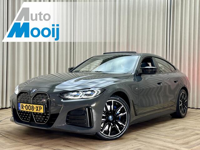 BMW i4 M50 84 kWh *M-Sport* Schuif/Kantel dak / Carbon / LASER LED / HUD / Harman Kardon / 360 Camera / Elek. Trekhaak / Org.NL!
