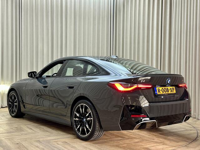 BMW i4 M50 84 kWh *M-Sport* Schuif/Kantel dak / Carbon / LASER LED / HUD / Harman Kardon / 360 Camera / Elek. Trekhaak / Org.NL!