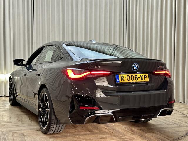 BMW i4 M50 84 kWh *M-Sport* Schuif/Kantel dak / Carbon / LASER LED / HUD / Harman Kardon / 360 Camera / Elek. Trekhaak / Org.NL!