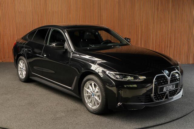 BMW i4 eDrive40 84 kWh M-pakket Navi Leer Elektr. achterklep 360° Camera Co-pilot Climate voor & achter Zwarte hemelbekleding PDC LM velgen BTW auto