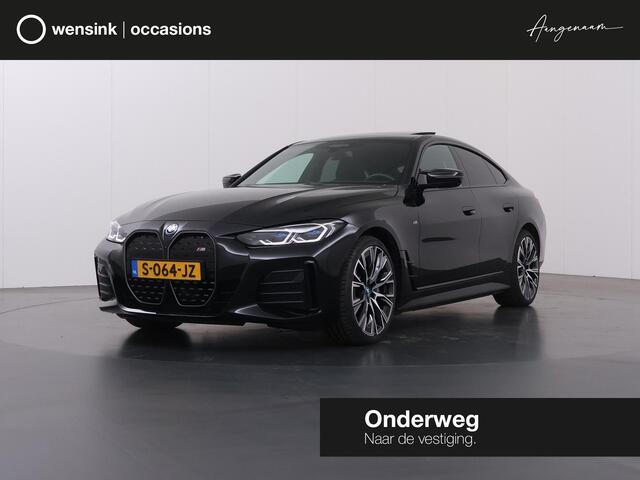 BMW i4 M50 High Executive 84 kWh | SOH 98% | M-Sport | Schuif/Kantel dak | Sportstoelen | Harman/Kardon | x-Drive | Widescreen | Adaptief Onderstel | DAB | Stoelen/stuur verwarmbaar | Trekhaak | Laserlicht |