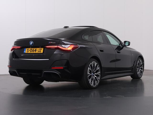 BMW i4 M50 High Executive 84 kWh | SOH 98% | M-Sport | Schuif/Kantel dak | Sportstoelen | Harman/Kardon | x-Drive | Widescreen | Adaptief Onderstel | DAB | Stoelen/stuur verwarmbaar | Trekhaak | Laserlicht |