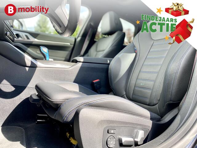 BMW i4 M50 544Pk High Executive 84 kWh Elektrisch verstelbare stoelen | Trekhaak 1600kg | Schuif/Kanteldak | Driving Assistant Professional | Harman Kardon Sound System | Head Up Display | Verwarmbaar stuurwiel | Interieurlijsten Carbon Fibre | Parking Assist.
