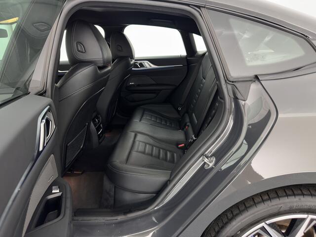 BMW i4 eDrive40 High Executive 84 kWh (3-Fase) [SOH-97%] (INCL-BTW) *AUT | HEAD UP | FULL-LED | HARMAN KARDON | ADAPTIVE-CRUISE | WIDE-SCREEN-DIGI-COCKPIT | DAB+ | CAMERA | AMBIENT-LIGHT | CARPLAY | LEATHER SPORT-SEATS | | 19''ALU*