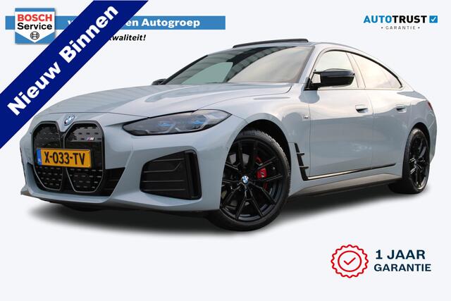 BMW i4 M50 High Executive 84 kWh | Incl. 12 maanden garantie | Assisted driving | Climate control | 360° camera | Uitklapbare trekhaak | Stoel/stuurverwarming | Head-up display | Schuif/kantel dak |