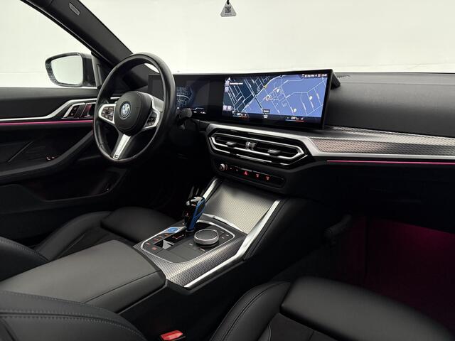 BMW i4 eDrive40 84 kWh M-Sport | SOH 94% | Snelladen | Pano | BMW Laser | Widescreen | Virtual | Adap. Cruise | Sfeer | Carplay | Camera | Stoelverw.