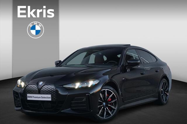 BMW i4 eDrive40 M Sportpakket Pro 19'' / Individual Interieur / Schuif-/kanteldak / Elektrisch verstelbare stoelen / Harman Kardon / Trekhaak
