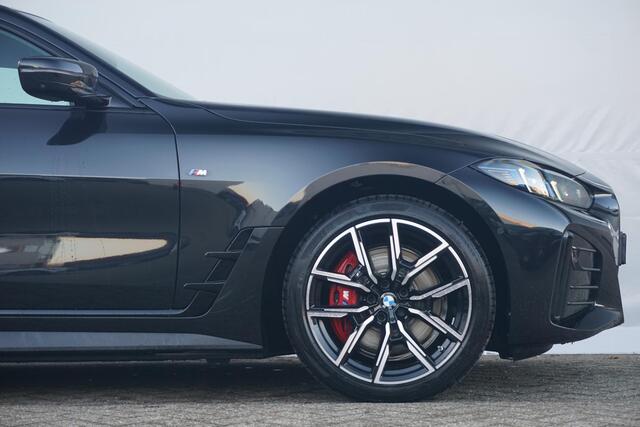 BMW i4 eDrive40 M Sportpakket Pro 19'' / Individual Interieur / Schuif-/kanteldak / Elektrisch verstelbare stoelen / Harman Kardon / Trekhaak