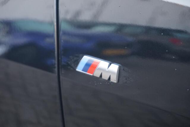 BMW i4 eDrive40 M Sportpakket Pro 19'' / Individual Interieur / Schuif-/kanteldak / Elektrisch verstelbare stoelen / Harman Kardon / Trekhaak