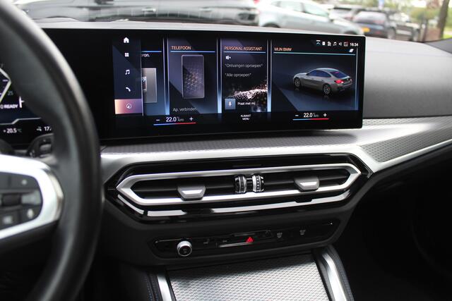 BMW i4 eDrive40 High Executive 84 kWh / Trekhaak / 360Camera / Head-up / Leder / 19'' / Navigatie / Stoelverwarming / DAB / Cruise Control