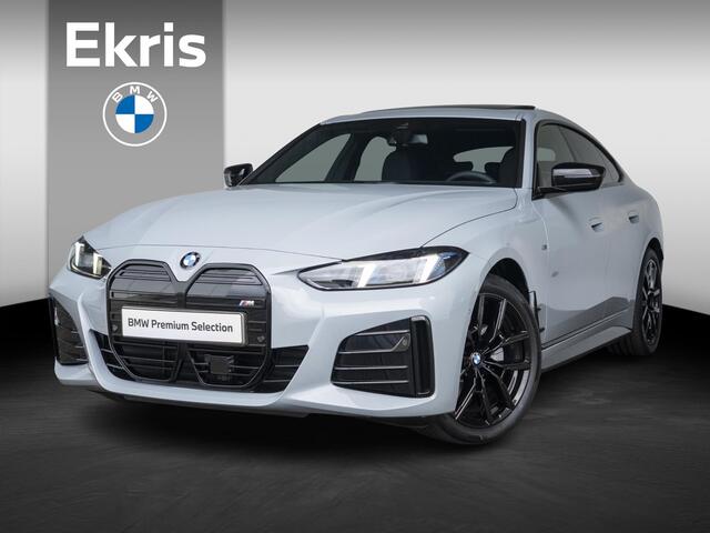 BMW i4 eDrive35 | M Sportpakket | Comfort Pack | Stuurwielrand verwarmd | Comfort Access | Achteruitrijcamera | Schuif-/kanteldak | Stoelverwarming