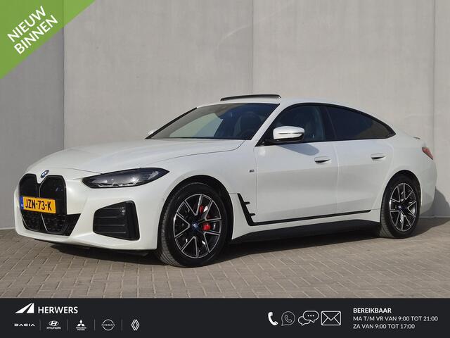 BMW i4 eDrive35 M Sport Edition 70 kWh Automaat / SOH 100% / CCS Snel Lader / Panoramadak / Lederen Bekleding / Dealer Onderhouden / Wide Screen Display / Stoelverwarming / Trekgewicht 1600 kg / Apple Carplay Android Auto /