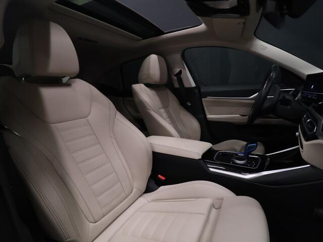 BMW i4 eDrive40 84 kWh [SCHUIFKANTELDAK, ADAPTIVE CRUISE CONTROL, APPLE CARPLAY, ANDROID AUTO, ACHTERUITRIJCAMERA, PDC V+A,STUURVERWARMING, BMW LED, NIEUWSTAAT]