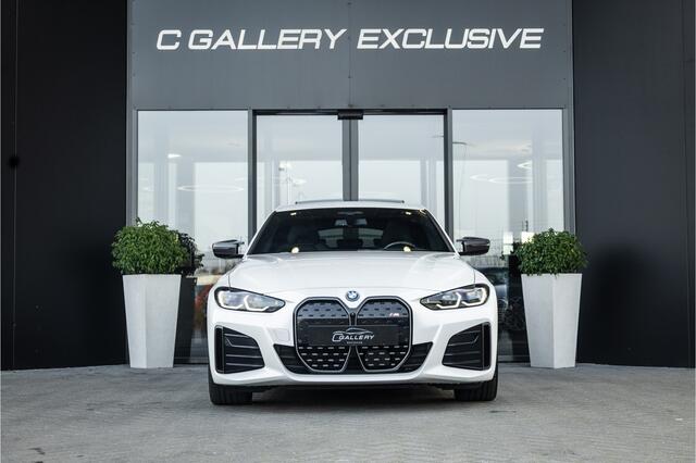 BMW i4 M50 High Executive 84 kWh - M Sport | Panorama | Carbon | 360 Camera | Sportstoelen